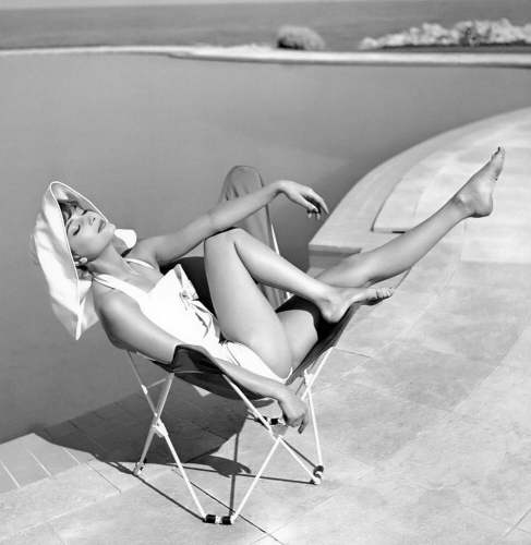 Marie-Hélène Arnaud at Eden Roc, Cap d'Antibes photographed by Georges Dambier for Elle, June 1957.jpg